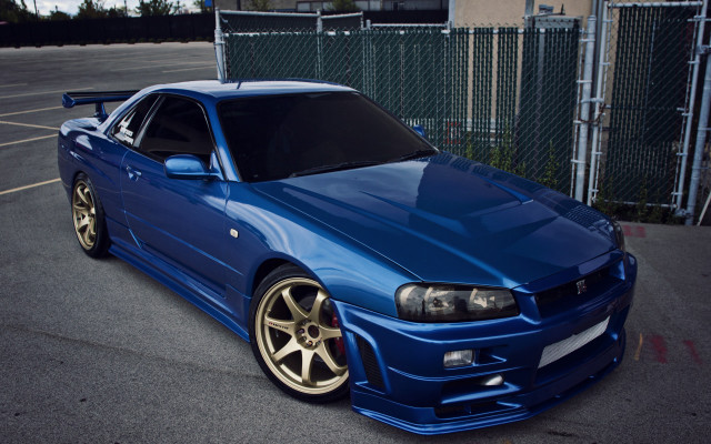 Blue car parking lot chainlink free wallpaper - medium preview image