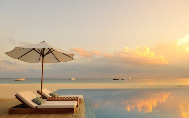 Lounge chairs pool deck umbrella free wallpaper - medium preview image