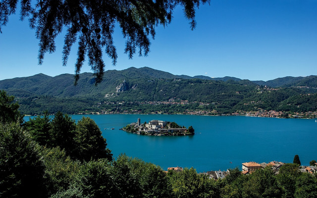 Lake mountains trees island church free wallpaper - medium preview image