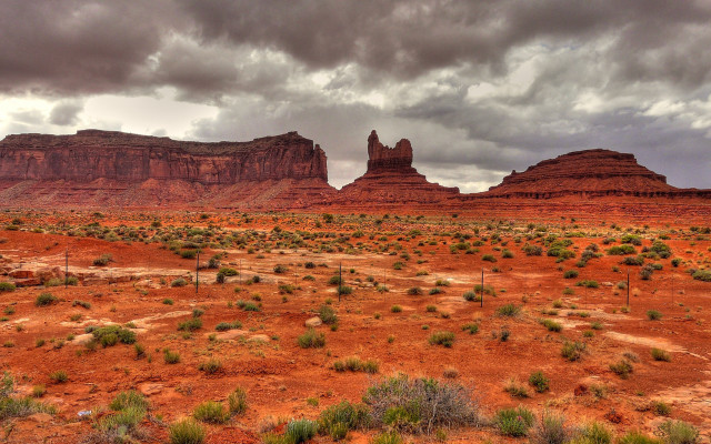 Desert rock formation cloudy sky free wallpaper - medium preview image