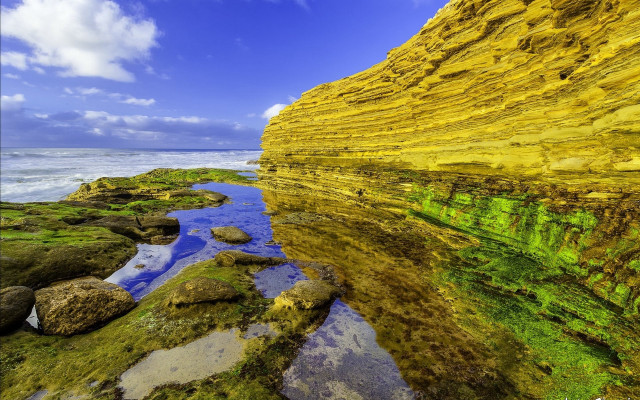 Rocky shore mossy rocks cloudy free wallpaper - medium preview image