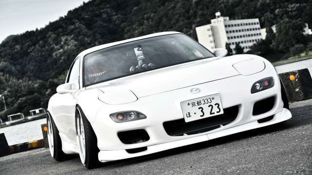 White sports car road water free wallpaper - medium preview image