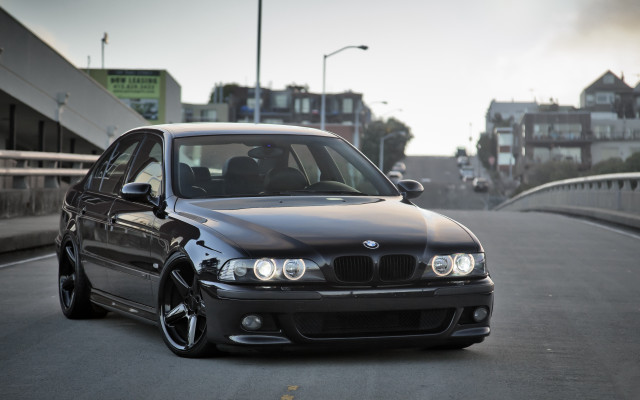 Black car bridge city person free wallpaper for desktop - medium preview image