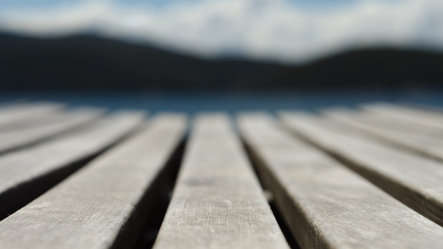 Wooden table sky mountain blur free wallpaper - medium preview image