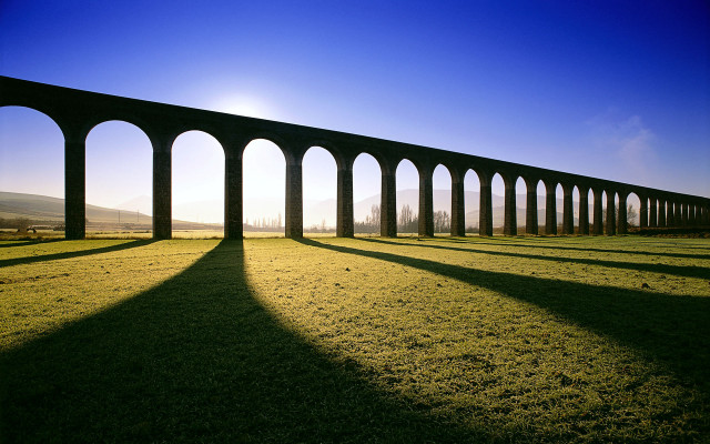 Train shadow precisionism bright sky free wallpaper - medium preview image