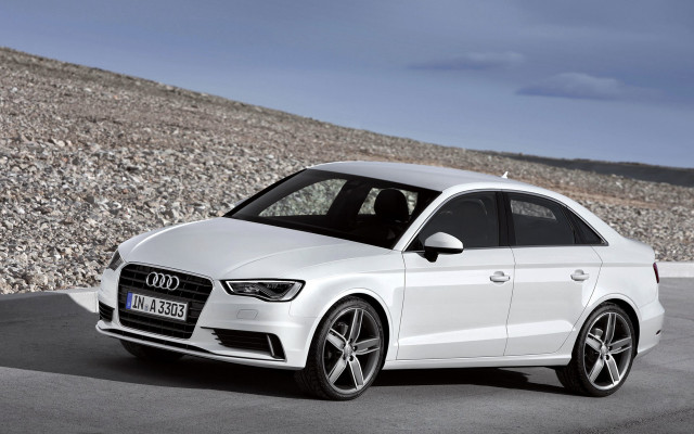 White car hill rocks clouds free wallpaper - medium preview image