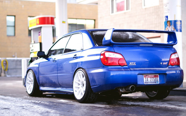 Blue car gas station puzzle free wallpaper - medium preview image