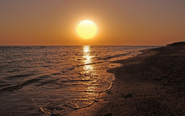 Sunset ocean beach island boat free wallpaper - medium preview image