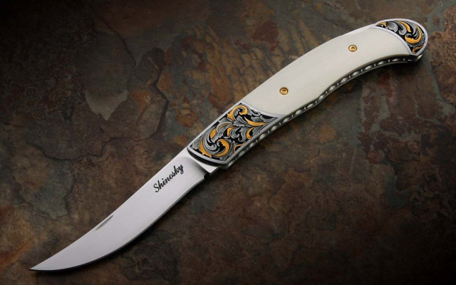 Gold black knife stone surface free wallpaper - medium preview image