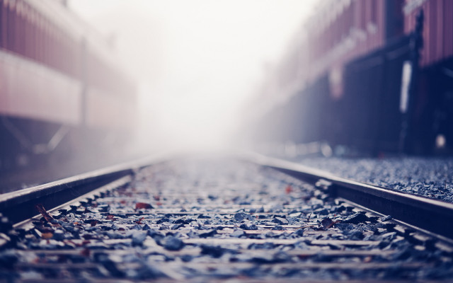 Train track foggy sky tiltshift free wallpaper - medium preview image