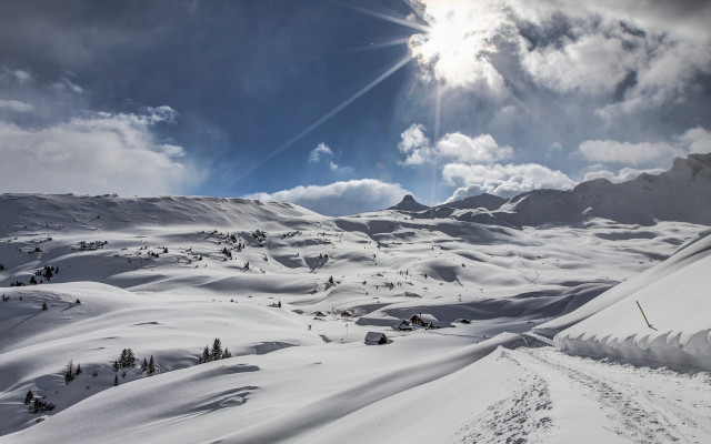 Snow mountain trail sunlight ocean free wallpaper - medium preview image
