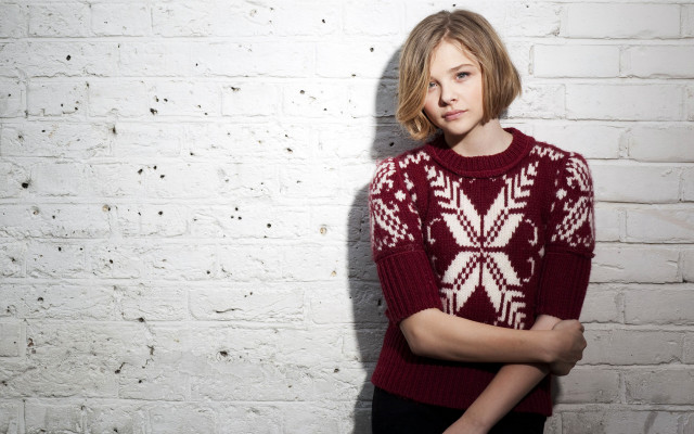 Woman red sweater white brick free wallpaper - medium preview image