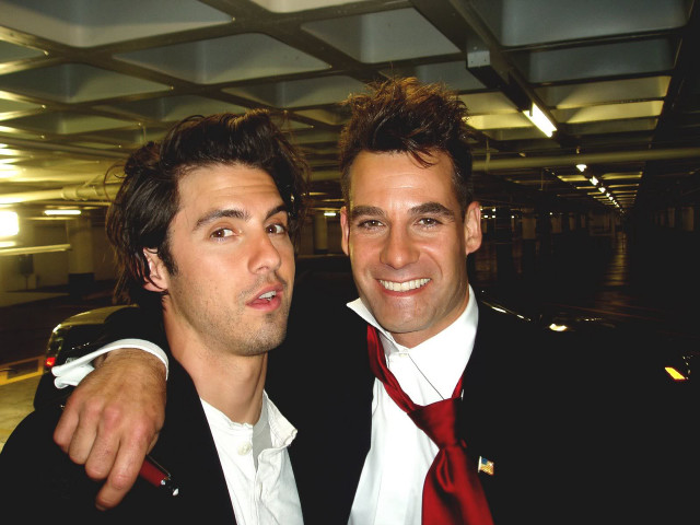 Two men suits parking garage free wallpaper - medium preview image