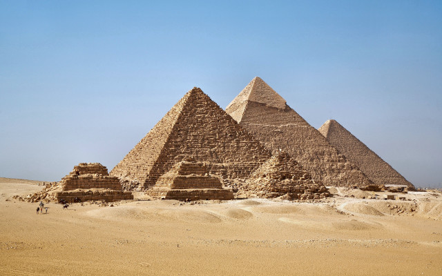 Pyramids desert sky person sand free wallpaper - medium preview image
