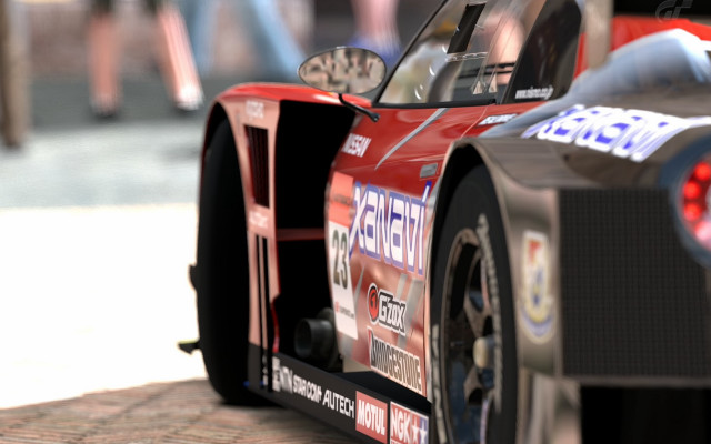 Red race car number blurry free wallpaper - medium preview image