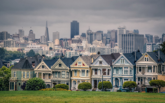 Cityscape houses cloudy sky green free wallpaper - medium preview image