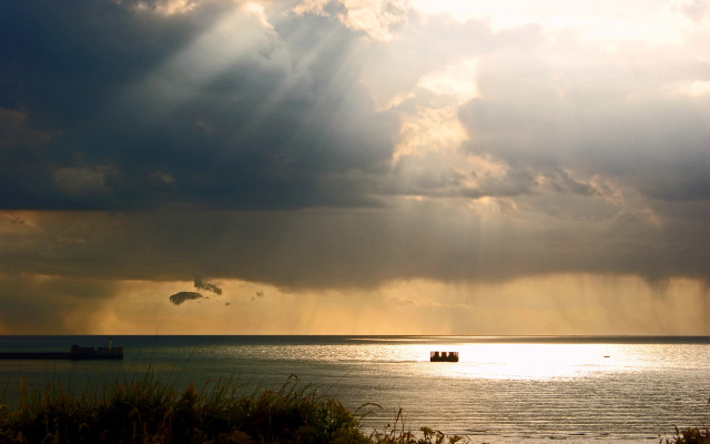 Boat sunset mountain ocean godrays free wallpaper - medium preview image