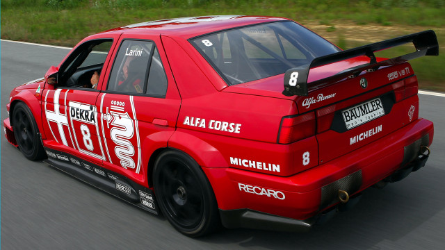 Red car driving road number free wallpaper - medium preview image
