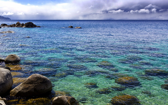 Water rocks sky clouds beach free wallpaper - medium preview image