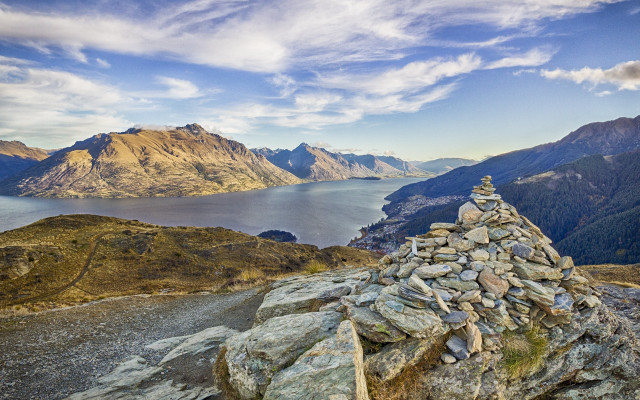 Rock pile mountain lake clouds free wallpaper - medium preview image