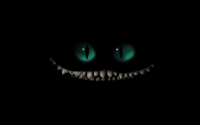 Black background green eyes smile #2 free wallpaper - medium preview image