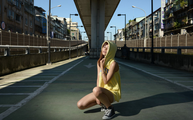 Woman yellow dress sitting urban free wallpaper - medium preview image