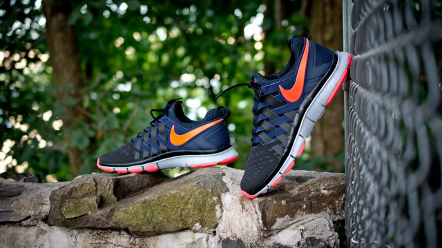 Nike shoes fence park trees free wallpaper - medium preview image