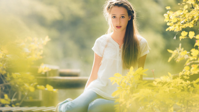 Woman bench park yellowflowers greentree free wallpaper - medium preview image