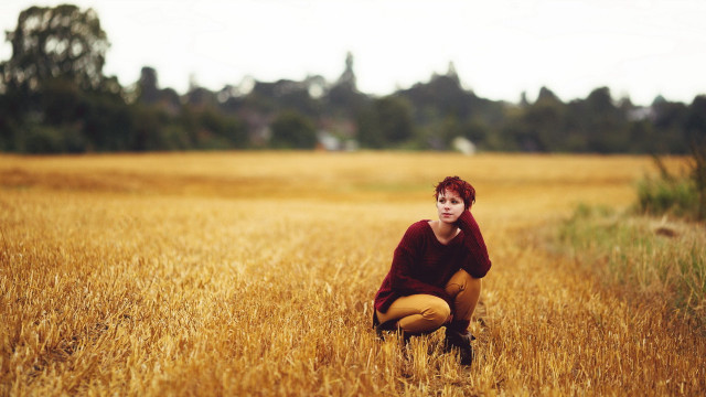 Woman kneeling wheat field red free wallpaper - medium preview image