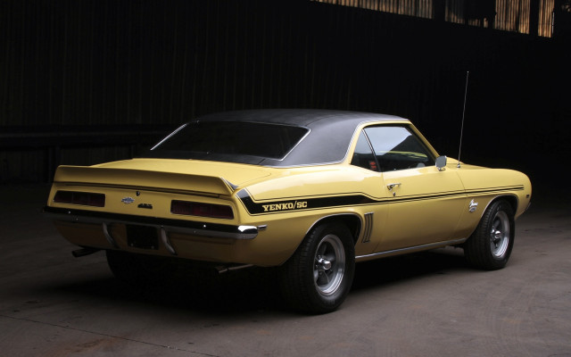 Yellow car garage black roof free wallpaper - medium preview image
