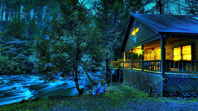 Cabin river night lit window free wallpaper - medium preview image
