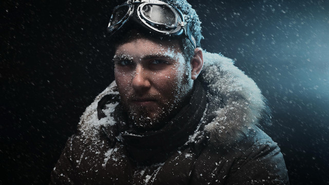 Snowy astronaut goggles citylights aurora free wallpaper - medium preview image