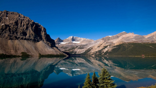 Mountain lake reflection bridge city free wallpaper - medium preview image