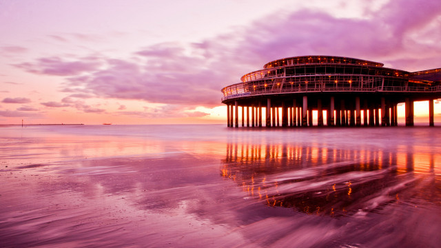 Pier building sunset reflection cityscape free wallpaper - medium preview image