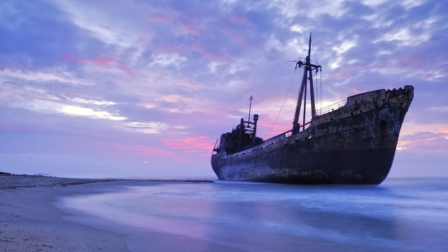 Ship sunset beach water mountain free wallpaper - medium preview image