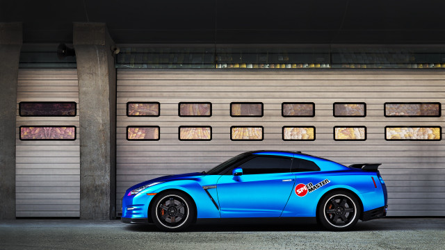 Blue sports car garage door free wallpaper - medium preview image