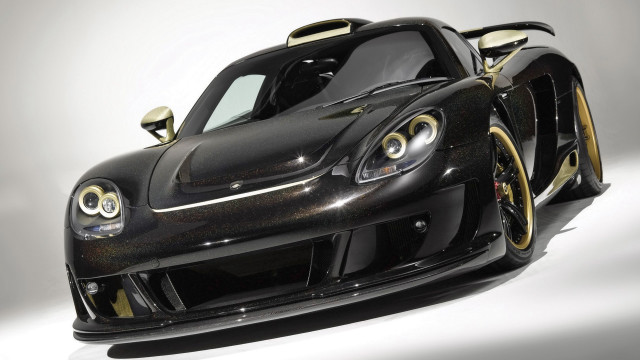 Black gold sports car reflection free wallpaper - medium preview image