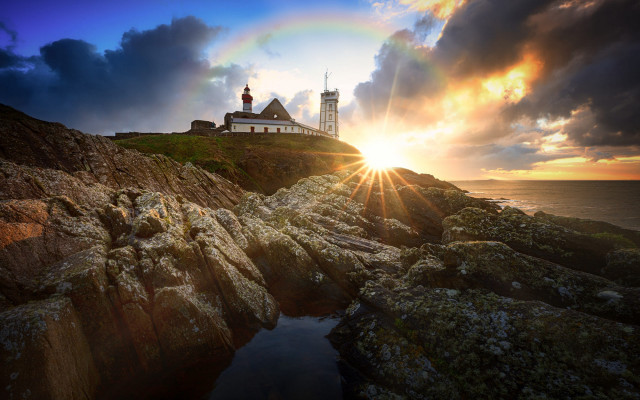Lighthouse rocky cliff rainbow city free wallpaper - medium preview image
