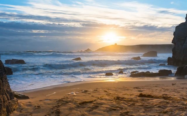 Beach rock formation sunset waves free wallpaper - medium preview image