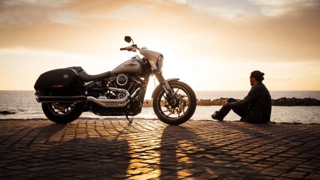 Man motorcycle ocean sunset beach free wallpaper - medium preview image