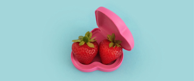 Strawberries pink container blue background free wallpaper - medium preview image
