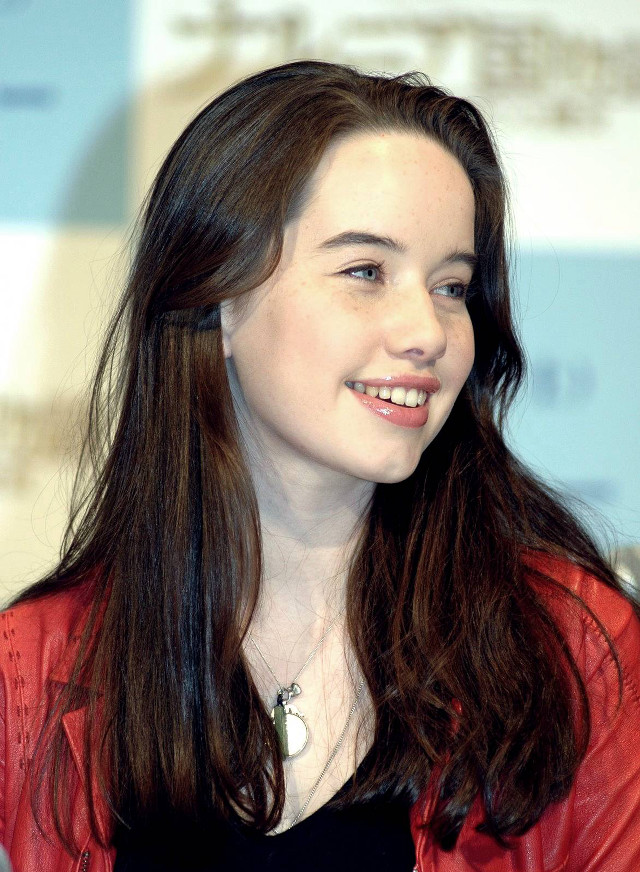 Woman long hair red jacket free wallpaper - medium preview image