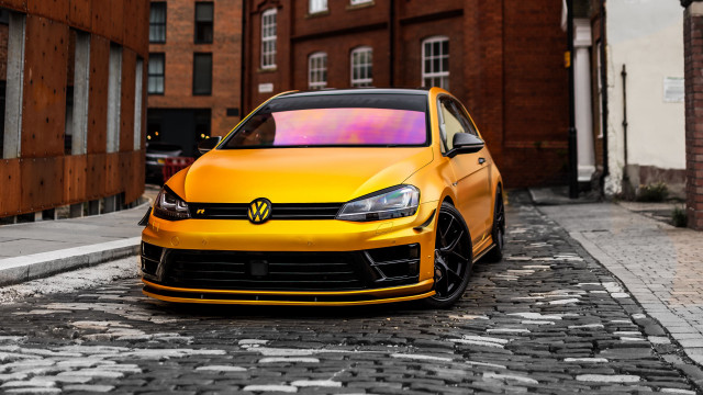 Yellow car cobblestone street brick free wallpaper - medium preview image