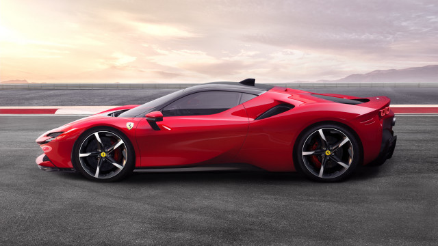 Red sports car mountain track free wallpaper - medium preview image