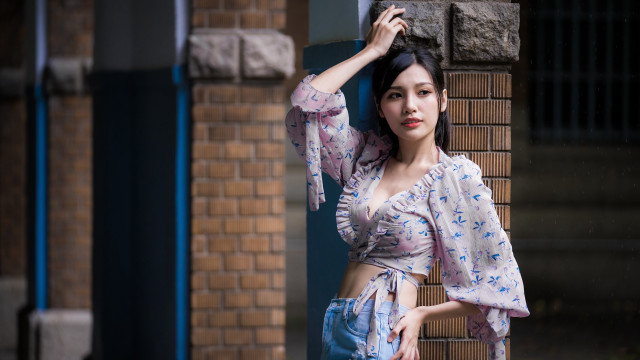 Woman brick wall blue white free wallpaper - medium preview image