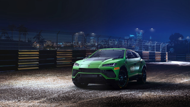 Green sports car night cityscape free wallpaper - medium preview image