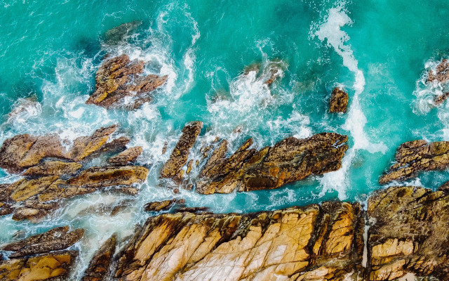 Rocky shore ocean cave water free wallpaper - medium preview image