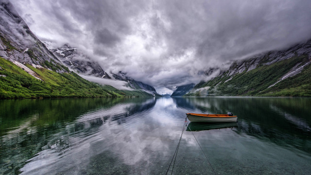 Mountain lake boat cloudy sky free wallpaper - medium preview image