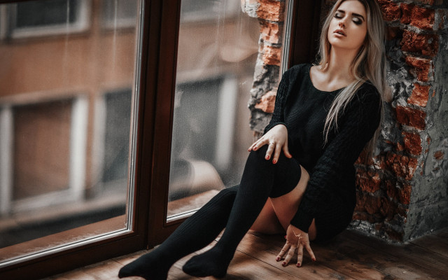 Woman sitting window still blurry free wallpaper - medium preview image