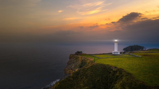 Lighthouse cliff ocean sunset cityscape #2 free wallpaper - medium preview image